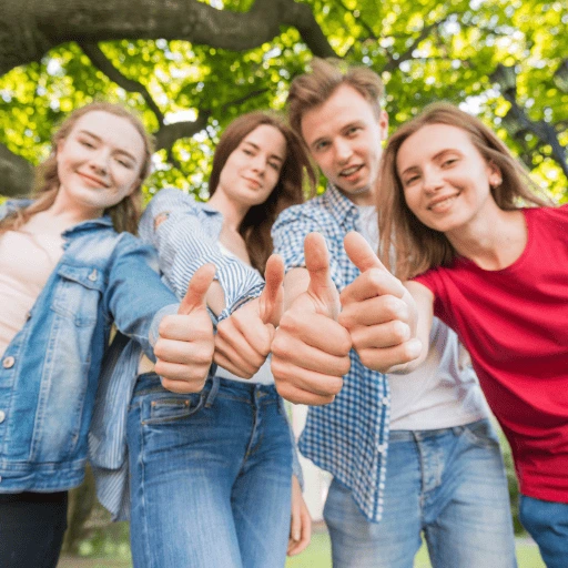 Group of friends doing thumbsup